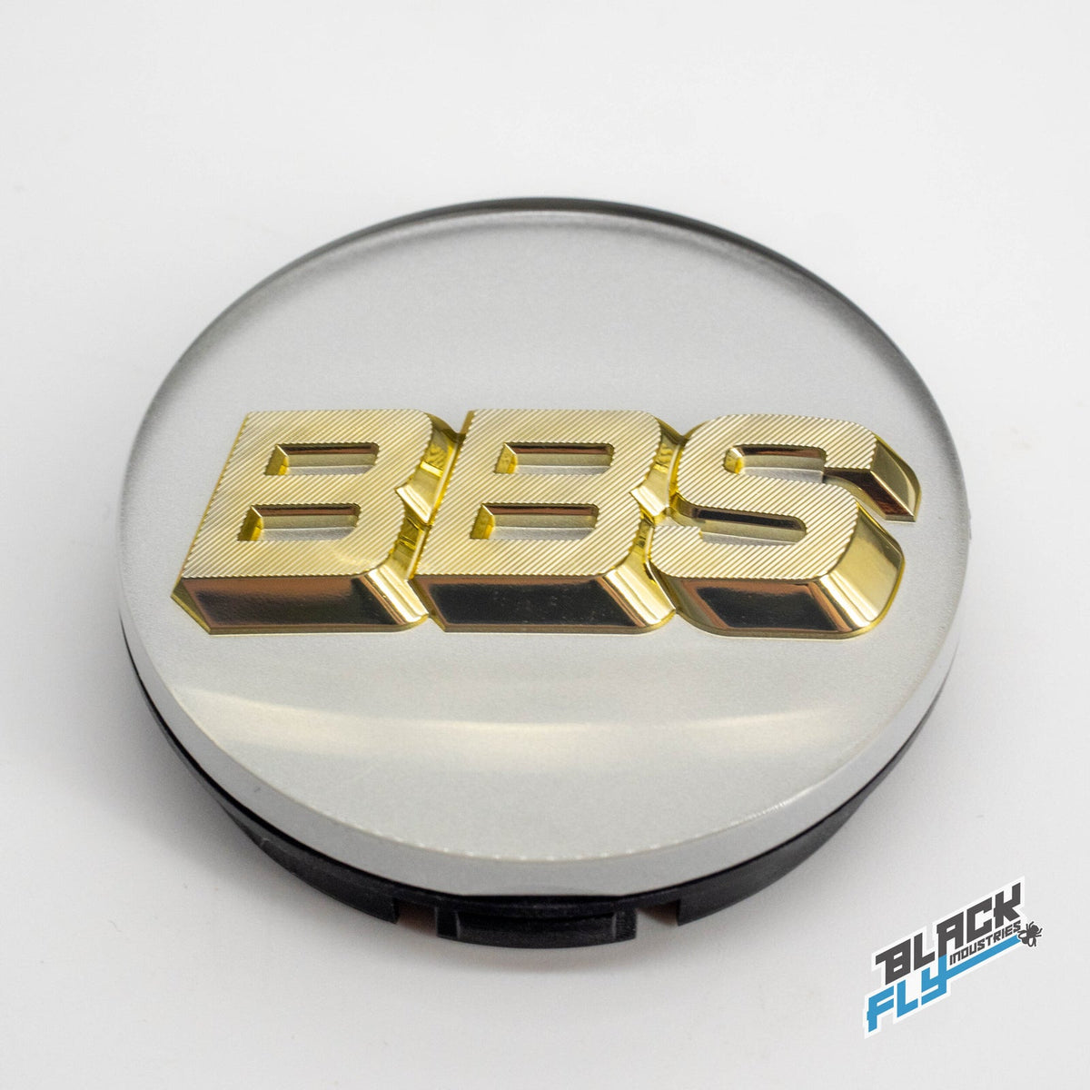 BBS Wheels and Accessories collection featuring alloy rims, tires, caps, and install gear on display.