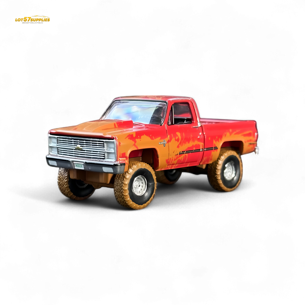 Auto World 1983 Chevrolet Silverado K10 4x4 Muddy Lifted 1:64
