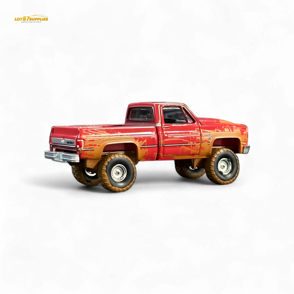Auto World 1983 Chevrolet Silverado K10 4x4 Muddy Lifted 1:64