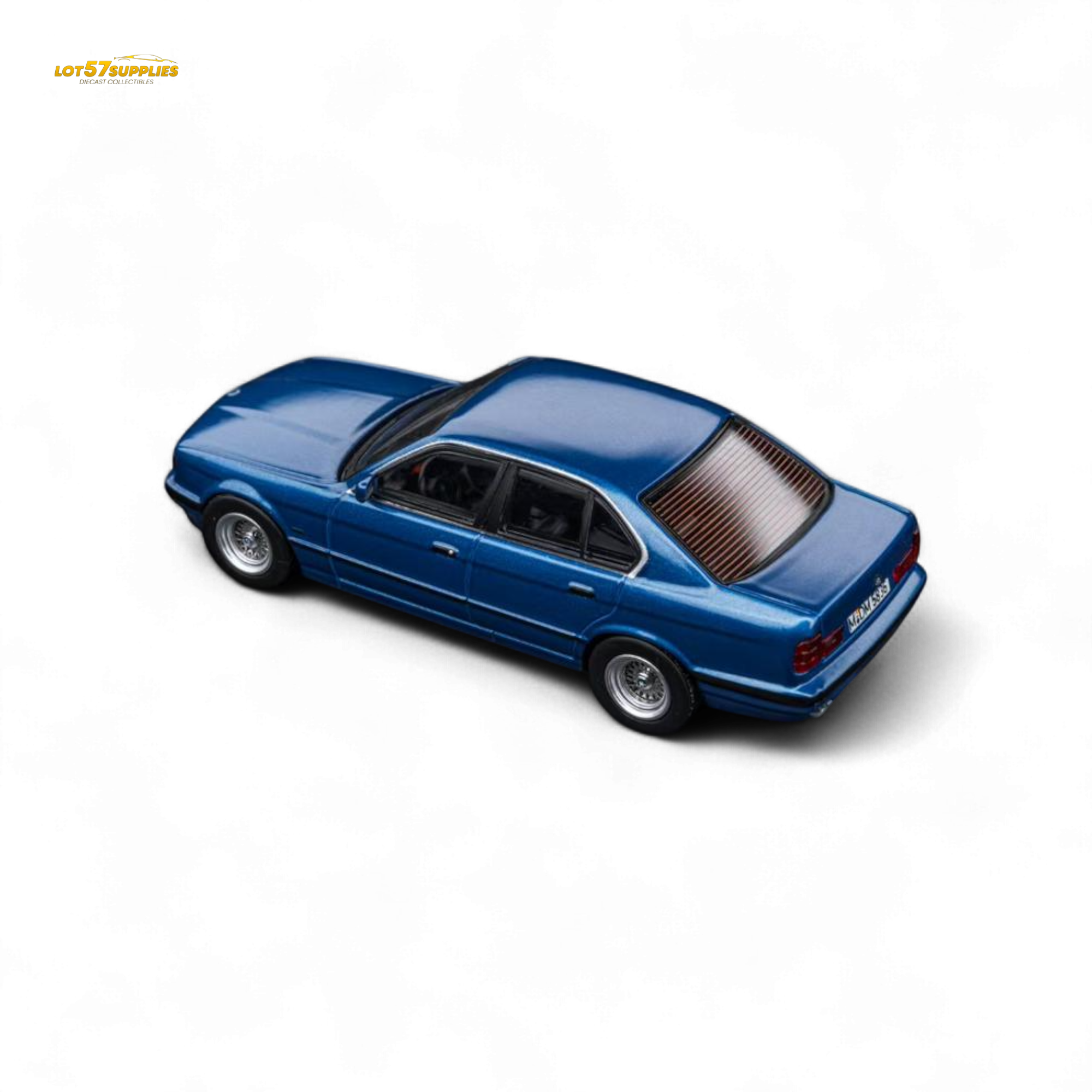 DCM BMW E34 5-Series Sedan Avis Metallic Blue 1:64