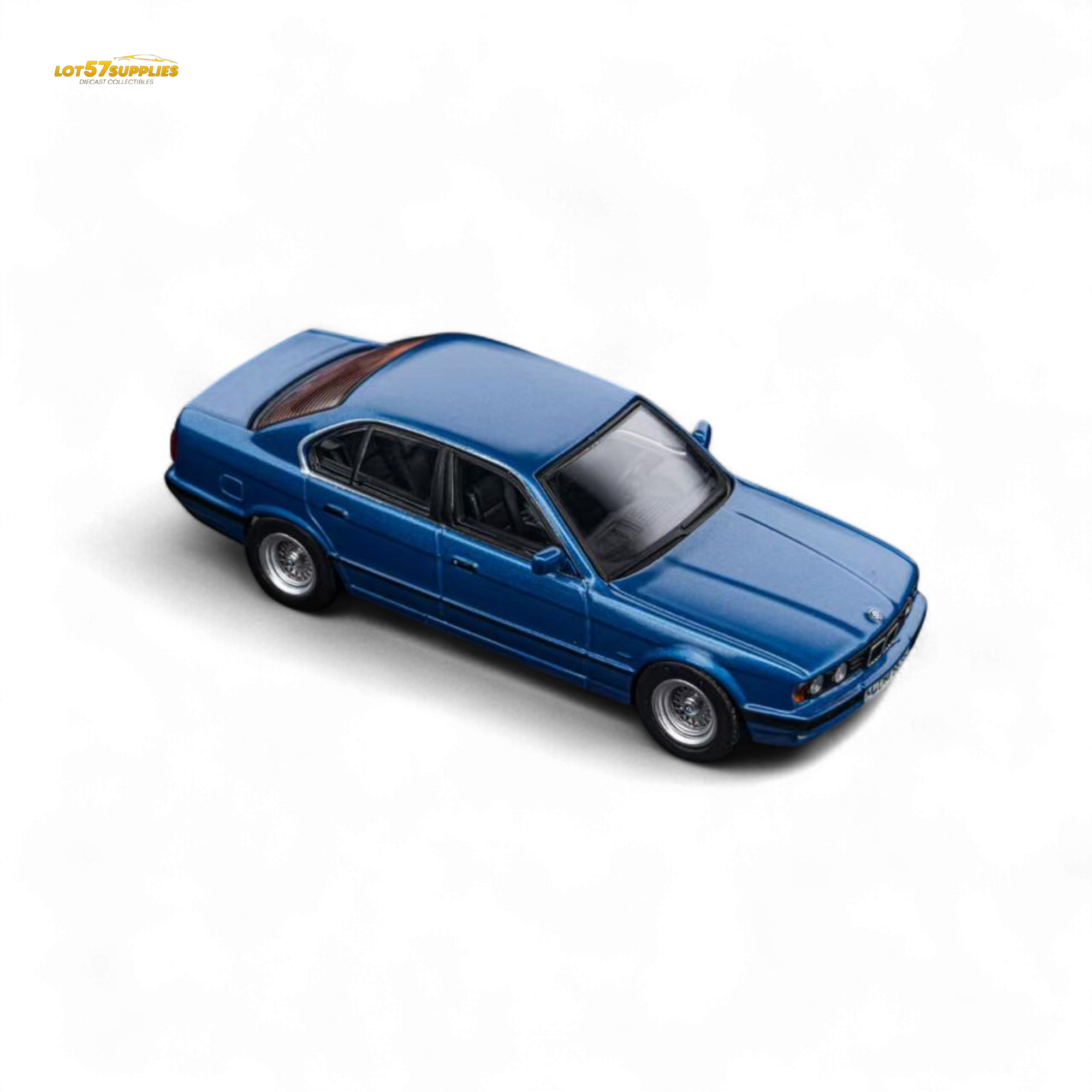 DCM BMW E34 5-Series Sedan Avis Metallic Blue 1:64