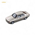 DCM BMW E32 7-Series Sedan Cashmere Beagle Gold 1:64