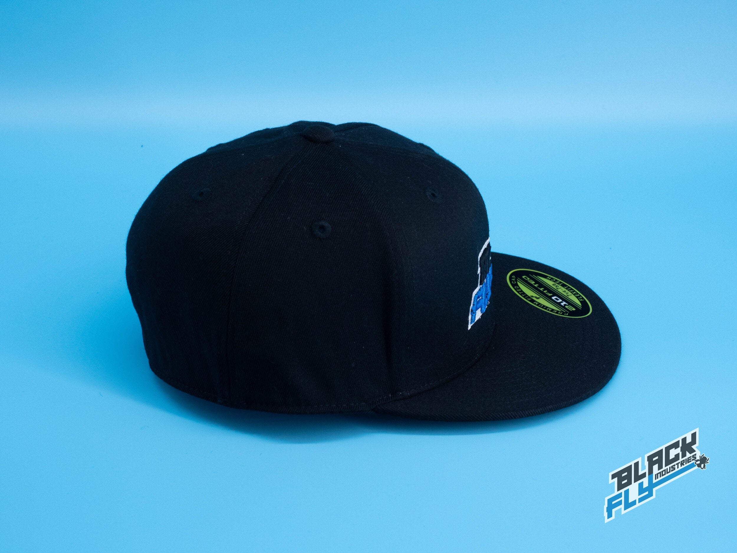 Black Fly Industries Flexfit 210 Flat Bill hat- Black with blue logo